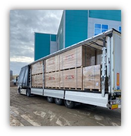 solar panels being carried by a truck