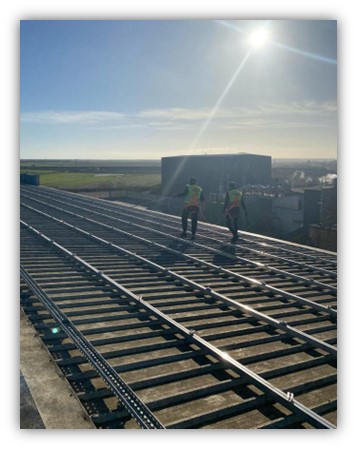 workers working on a rooftop