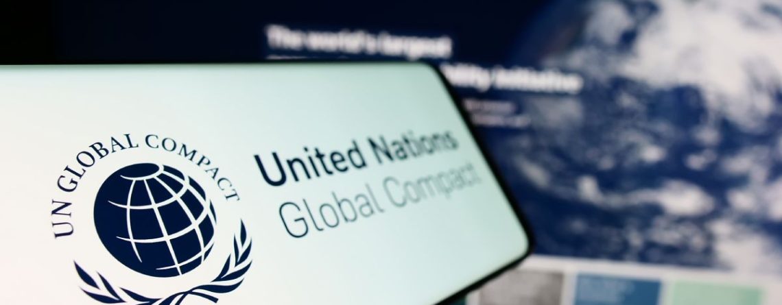 united nations global compact logo shown on phone