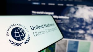 united nations global compact logo shown on phone